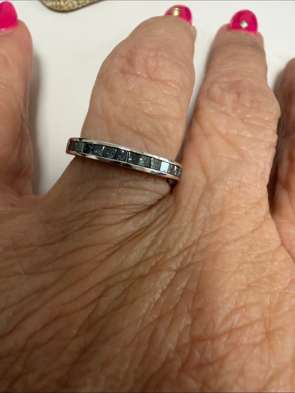 Sterling Silver ring with blue diamonds. Size 7